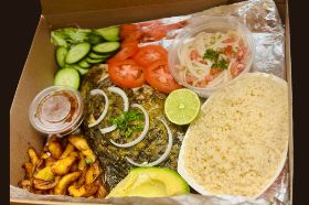 Seasoned grilled pompano with assorted veggies comes with a complementary Alloko and your choice of Attieke or French Fries. Fried rice is an extra charge.