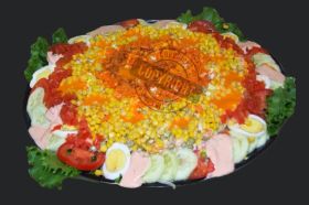 Exotic and tasty it is a mix of corns, eggs, cucumber, carrot, green sweet peas, tomatoes and red peppers with touch of secrets dressing. large for up to 20people and small for 10 people.